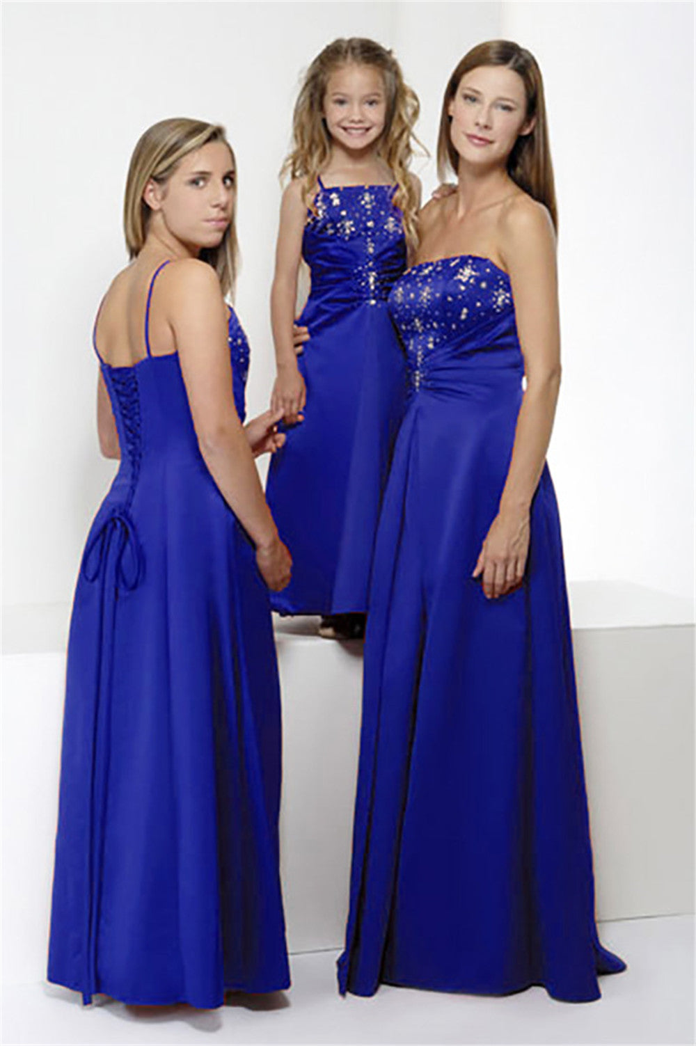 Royal blue full-length bridesmaid dress style 0154 with sequined accents and straight neckline, presented on adult, teen, and child models for bridal parties.