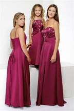 3 models wearing the same full length long burgundy satin corset a-line bridesmaid dress with sequin detail, shown in strapless and spaghetti strap styles, multi-colour options